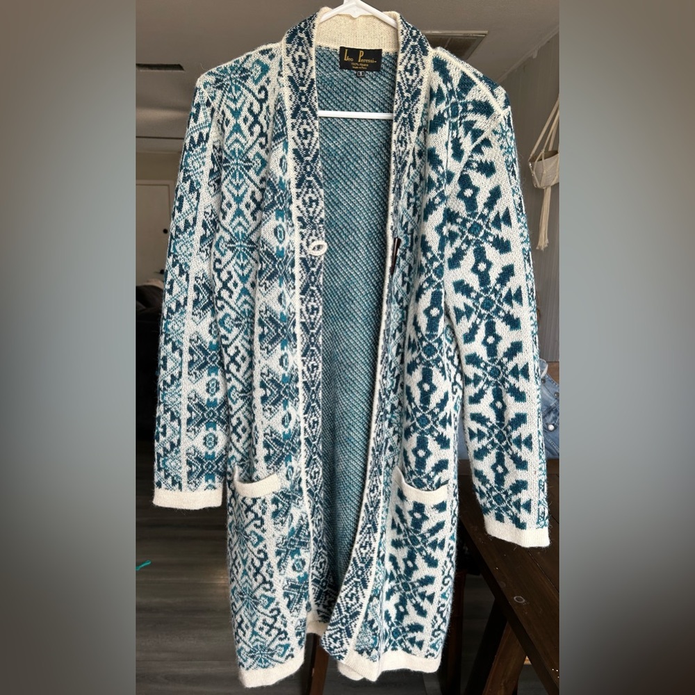 Leo Peressi 100% alpaca long cardigan. Very heavy and warm. Snags easily